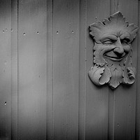 Buy canvas prints of The Winking Green Man by Adrian Wilkins
