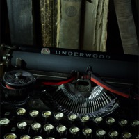 Buy canvas prints of Vintage Typewriter and Old Books by Ann Garrett