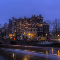 Buy canvas prints of Amsterdam Corner Cafe with Light Trails by Ann Garrett