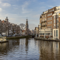 Buy canvas prints of The Amstel  Amsterdam by Ann Garrett