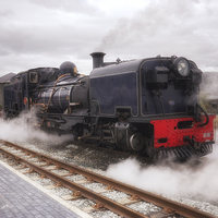 Buy canvas prints of Steam Engine in Porthmadog by Ann Garrett