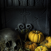 Buy canvas prints of Skull Headstone and Pumpkins by Ann Garrett