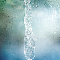Buy canvas prints of Icicle Through Glass by Ann Garrett
