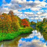 Buy canvas prints of Riverside Autumn Trees by David Atkinson