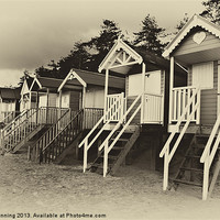 Buy canvas prints of Wells beach huts in sepia by Mark Bunning