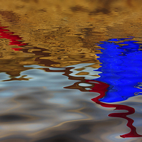 Buy canvas prints of Reflection of a bucket and spade by Mark Bunning