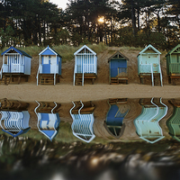 Buy canvas prints of Reflected beach huts by Mark Bunning