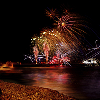Buy canvas prints of Cromer newyears day fireworks by Mark Bunning