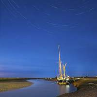 Buy canvas prints of Startrails over Blakeney by Mark Bunning
