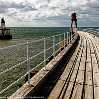 Buy canvas prints of The East Pier, Whitby by Paul M Baxter