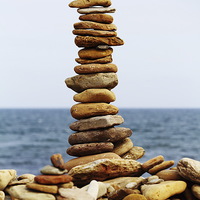 Buy canvas prints of  Stacking Stones by Paul M Baxter