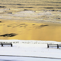 Buy canvas prints of  Whitby Sun. Sea, Sand and Snow by Paul M Baxter