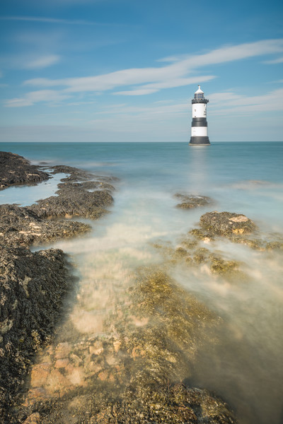 Lighthouse at Penmon Picture Board by Natures' Canvas: Wall Art  & Prints by Andy Astbury