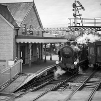 Buy canvas prints of Steam Train at Station, Wansford, Cambridgeshire, by David Tyrer