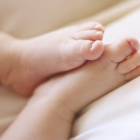Buy canvas prints of Baby Feet by David Yeaman