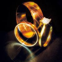 Buy canvas prints of Gold Engagement and Wedding Rings by David Yeaman