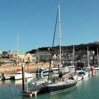Buy canvas prints of St Helier Harbour by Julie Ormiston