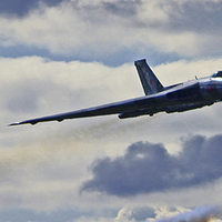 Buy canvas prints of  Vulcan flanked by Gnats by Tom Hard