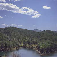 Buy canvas prints of Rocky Mountain Lake 1 by Judy Hall-Folde