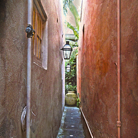 Buy canvas prints of Just a Narrow NOLA Alley by Judy Hall-Folde