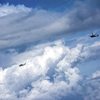 Buy canvas prints of Copters over the Atlantic by Judy Hall-Folde