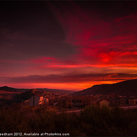 Buy canvas prints of A fiery sunset. by Sean Needham