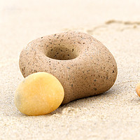 Buy canvas prints of Sandy Pebbles on the seashore by Andrew Ley