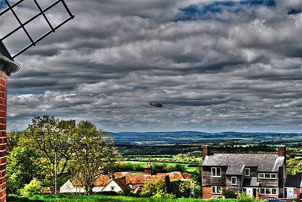 hellicopter over brill Picture Board by carl blake