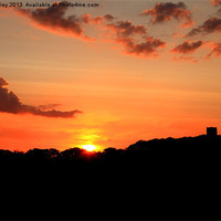 Buy canvas prints of Majestic Sunset Over Coastal Village by Digitalshot Photography