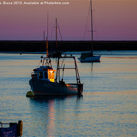Buy canvas prints of Fishing boat catches the last rays by Matthew Bruce