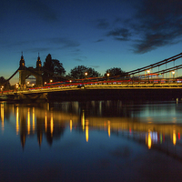 Buy canvas prints of  Hammersmith Bridge at night by Matthew Bruce