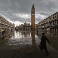Buy canvas prints of   Escaping the rain in Piazza San Marco by Matthew Bruce
