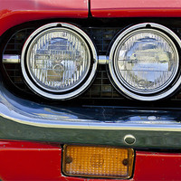 Buy canvas prints of Car Headlamps by Philip Pound