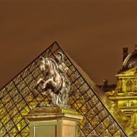 Buy canvas prints of Louvre Museum Paris De Nuit by Philip Pound