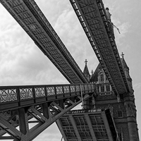Buy canvas prints of Tower Bridge - the drawbridge opens. by Philip Pound