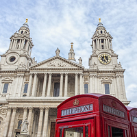 Buy canvas prints of  Red Telephone Boxes and St Paul's Cathedral, Lond by Philip Pound