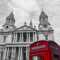 Buy canvas prints of  Red Phone boxes in front of black and white St Pa by Philip Pound