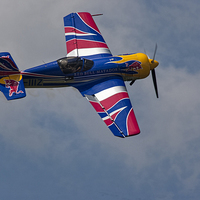 Buy canvas prints of  Red Bull Matador Aerobatic Airplane by Philip Pound