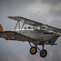 Buy canvas prints of  Hawker Nimrod II Historic Biplane Fighter in Flig by Philip Pound