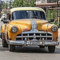 Buy canvas prints of  Very old yellow American car in Cuba by Philip Pound