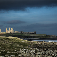 Buy canvas prints of Dunstanburgh Castle in Northumberland  by Philip Pound
