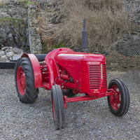 Buy canvas prints of  The Little Red Tractor by Derek Corner