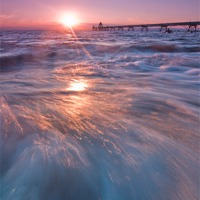 Buy canvas prints of Glistening under the sunset by mike Davies
