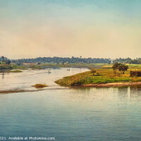 Buy canvas prints of The River Nile Flowing Through Egypt by Ian Lewis