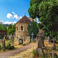 Buy canvas prints of The Churchyard at Goring Parish Church by Ian Lewis