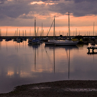 Buy canvas prints of Evening at Blakeney Quay by Ian Lewis