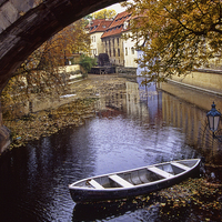 Buy canvas prints of Serene Prague Backwater by Ian Lewis