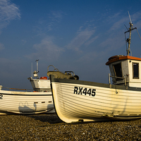 Buy canvas prints of Fishing Boats at Hastings by Ian Lewis