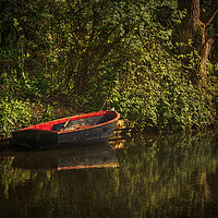 Buy canvas prints of Dinghy On The Oxford Canal by Ian Lewis