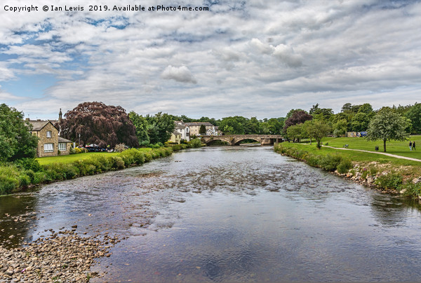 River Derwent Flowing Through Cockermouth Picture Board by Ian Lewis